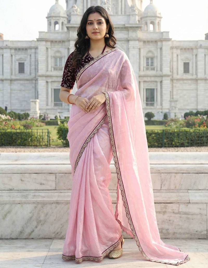 Pink color plain with contrast matching embroidered lace premium fendy silk saree with unstitched blouse