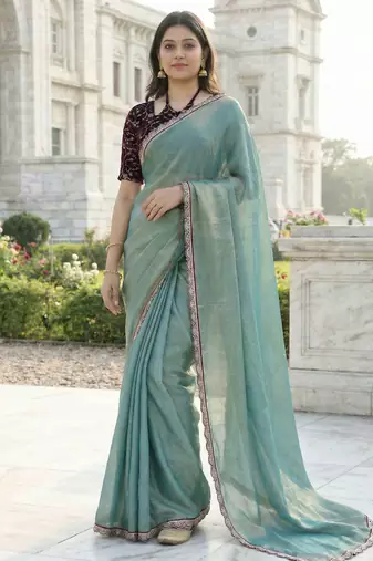 green fendy silk saree with contrast lace border