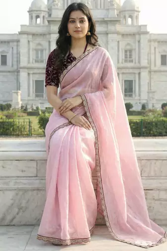 Pink color plain with contrast matching embroidered lace premium fendy silk saree with unstitched blouse
