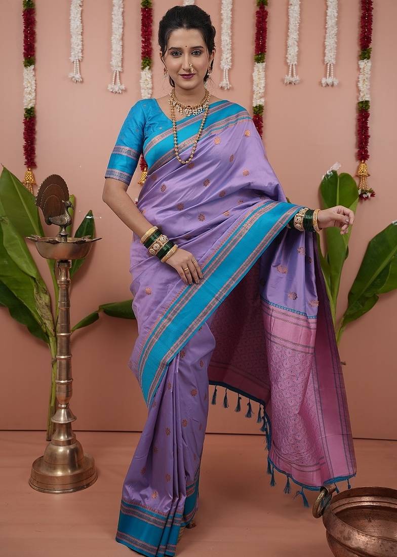 levender color narayani woven border zari work soft silk blend saree
