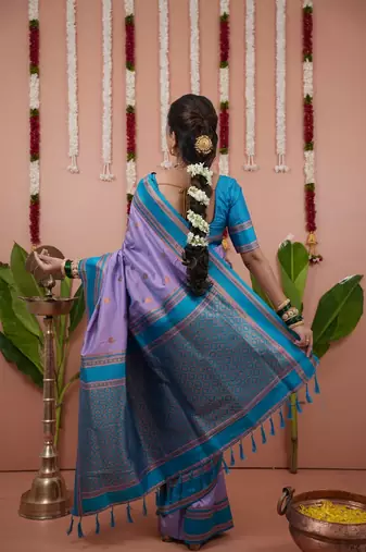 levender color narayani woven border zari work soft silk blend saree
