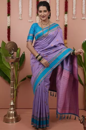 levender color narayani woven border zari work soft silk blend saree