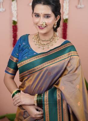 beige color narayani woven border zari work soft silk blend saree 2