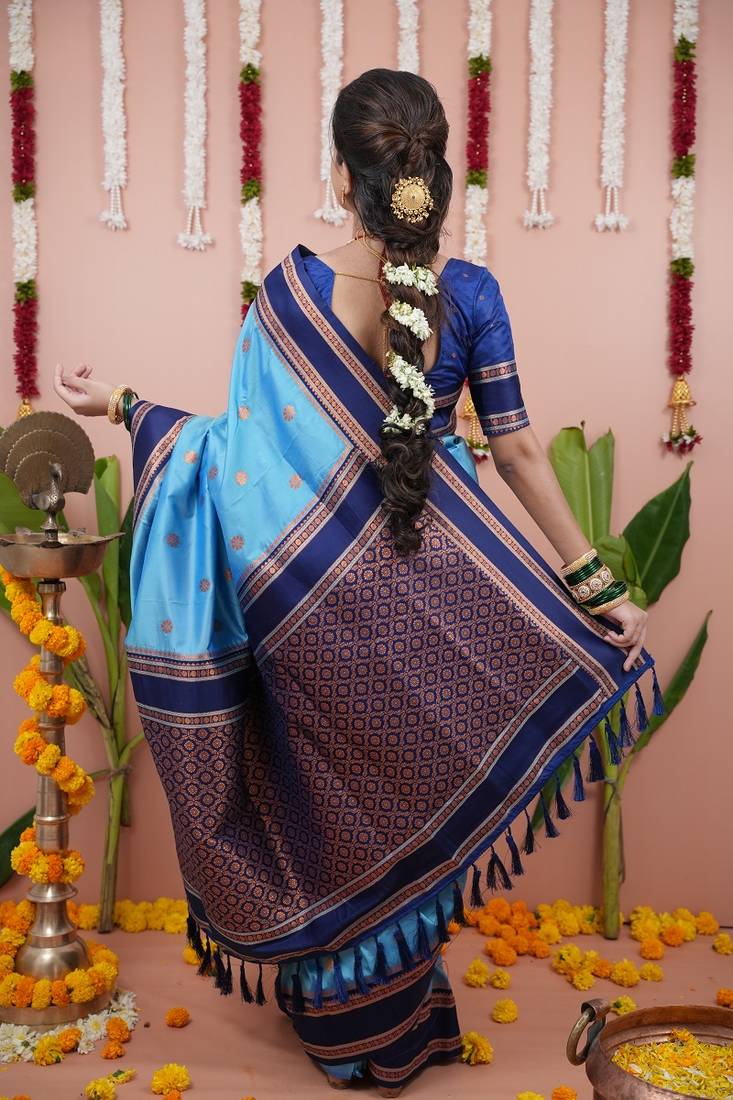 sky blue color narayani woven border zari work soft silk blend saree