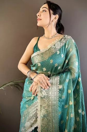 light rama color banarasi tissue crush zari woven border saree