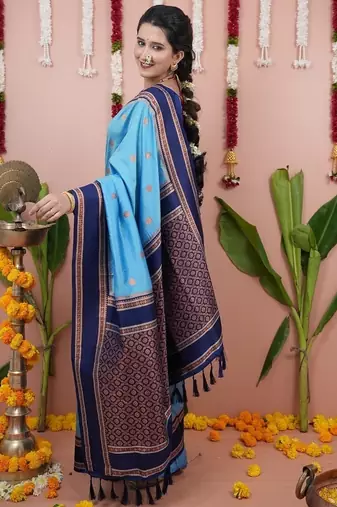 sky blue color narayani woven border zari work soft silk blend saree