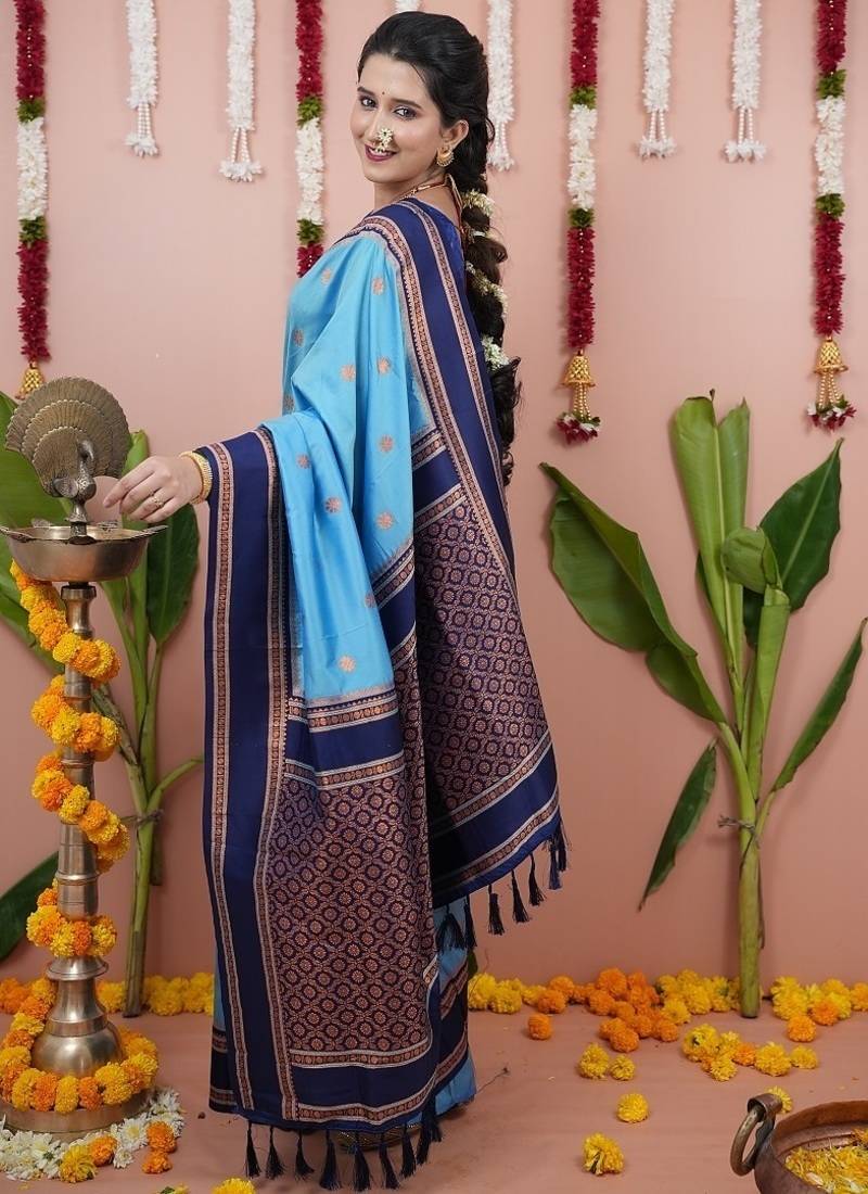 sky blue color narayani woven border zari work soft silk blend saree