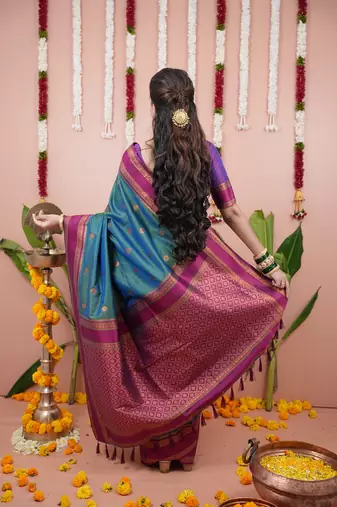green color narayani woven border zari work soft silk blend saree