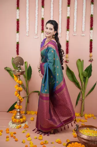 green color narayani woven border zari work soft silk blend saree
