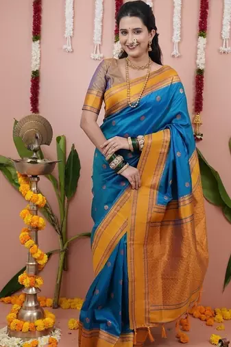 dark sky blue color narayani woven border zari work soft silk blend saree