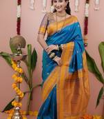dark sky blue color narayani woven border zari work soft silk blend saree
