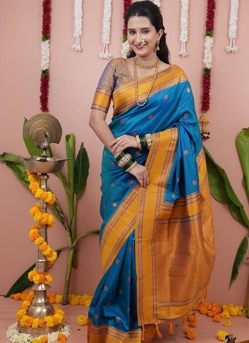 dark sky blue color narayani woven border zari work soft silk blend saree