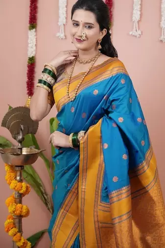 dark sky blue color narayani woven border zari work soft silk blend saree