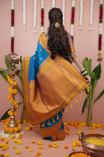 dark sky blue color narayani woven border zari work soft silk blend saree
