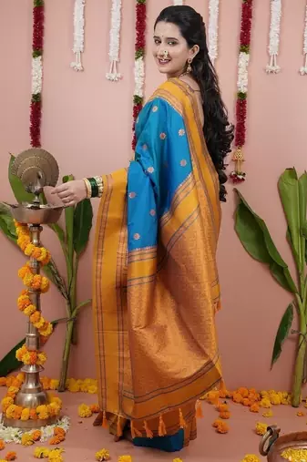 dark sky blue color narayani woven border zari work soft silk blend saree
