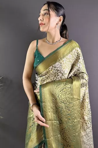 green color zari weaving work kanjivaram tissue art silk blend saree