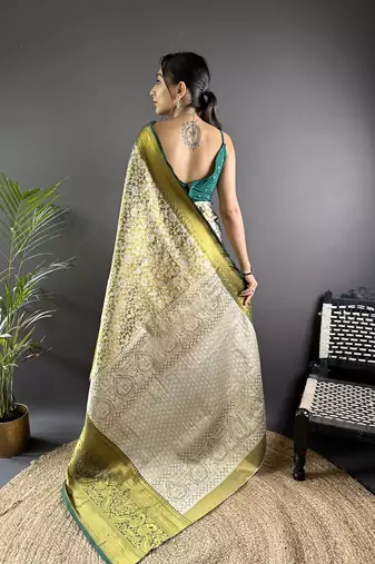 green color zari weaving work kanjivaram tissue art silk blend saree