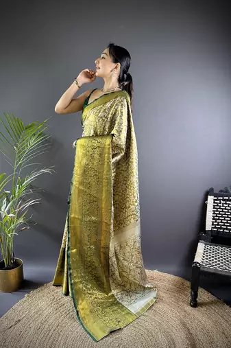 green color zari weaving work kanjivaram tissue art silk blend saree