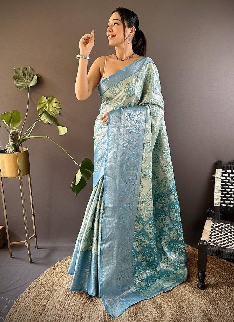chiku & skyblue color zari weaving work kanjivaram tissue silk saree