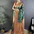 green color flower zari weaves banarasi katan silk saree