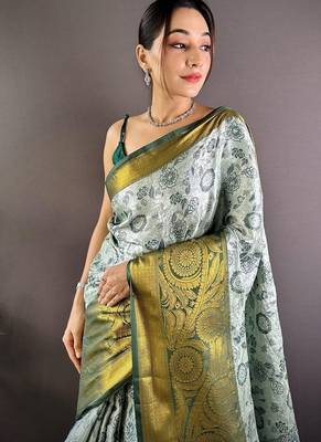 green color woven zari work kanjivaram tissue art silk blend saree 2