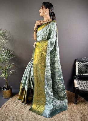 green color woven zari work kanjivaram tissue art silk blend saree 3