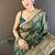 green color banarasi tissue crush zari woven border saree