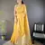 yellow color cotton checks zari border work saree