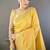 yellow color cotton checks zari border work saree