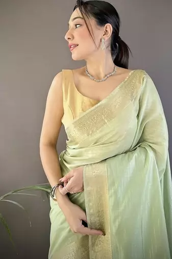 pista color cotton checks zari border work saree