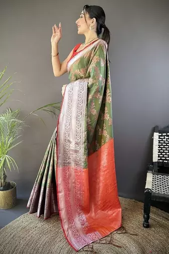 green color banarasi soft art silk blend zari woven work saree