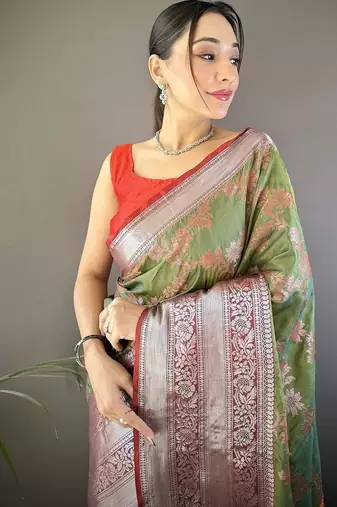 green color banarasi soft art silk blend zari woven work saree