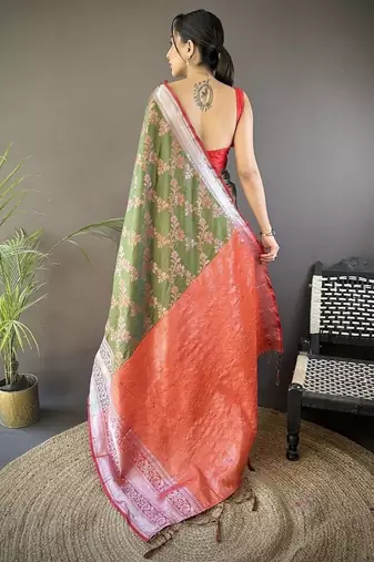 green color banarasi soft art silk blend zari woven work saree