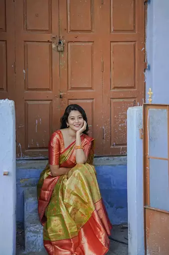 parrot green color weaving zari border kanjivaram semi art silk blend saree