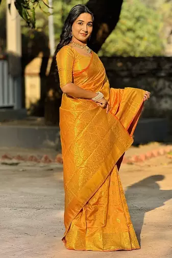 orange color zari woven banarasi art silk blend saree
