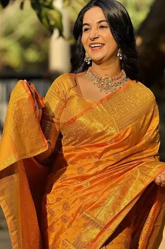 orange color zari woven banarasi art silk blend saree