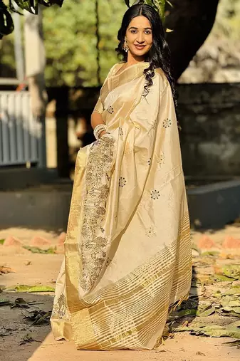 off-white color tussar art silk blend weaving zari border & kalamkari embroidered saree