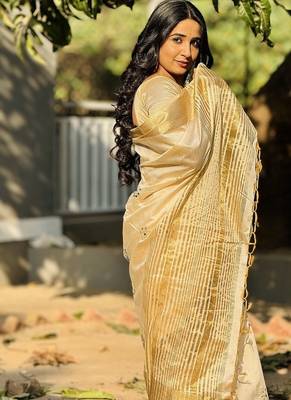 off-white tussar art silk blend weaving zari border & kalamkari embroidered saree 3