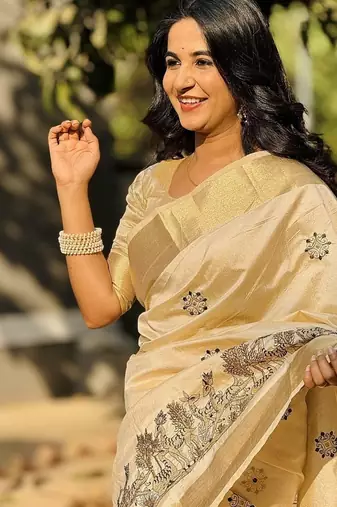 off-white color tussar art silk blend weaving zari border & kalamkari embroidered saree