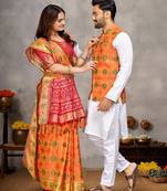 Elegant men's kurta with jacquard silk koti & women's orange saree set