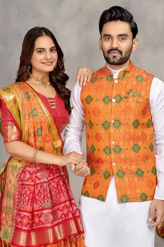 Elegant men's kurta with jacquard silk koti & women's orange saree set