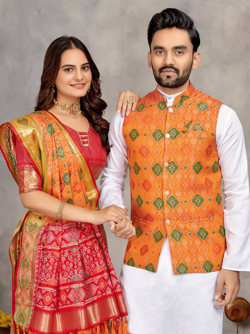 Elegant men's kurta with jacquard silk koti & women's orange saree set