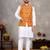 Elegant men's kurta with jacquard silk koti & women's orange saree set