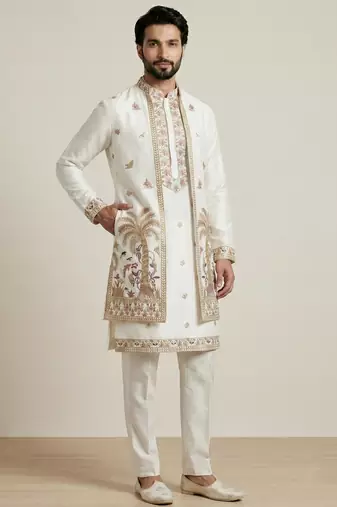 white doniyar shartin kurta set with long embroidered jacket