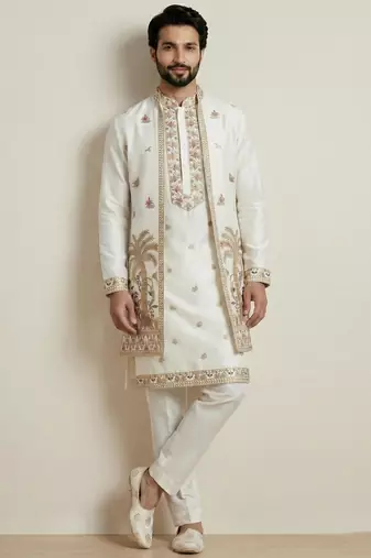 white doniyar shartin kurta set with long embroidered jacket