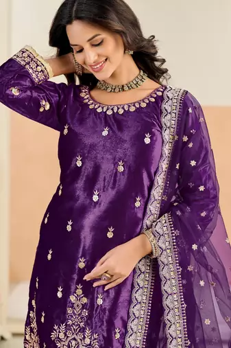Purple color festive special velvet fabric ethnic embroidered partywear suit