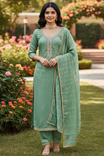 Green color chanderi butti fabric beautiful embroidered suit