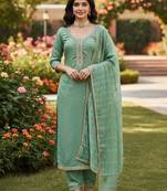 Green color chanderi butti fabric beautiful embroidered suit