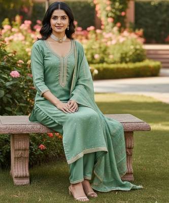 Green color chanderi butti fabric beautiful embroidered suit 2