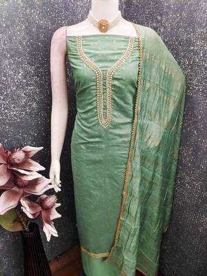 Green color chanderi butti fabric beautiful embroidered suit 4